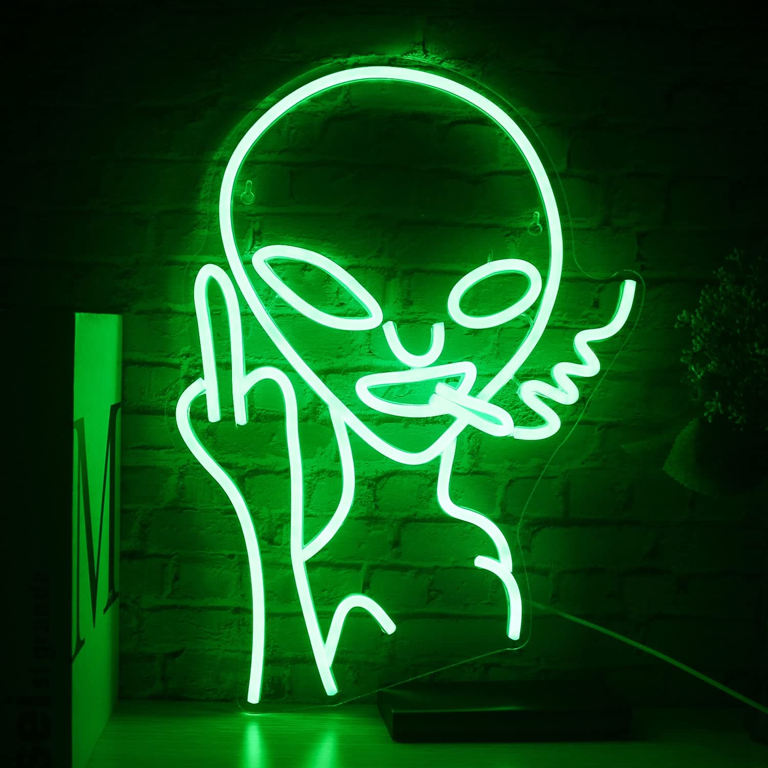 Green alien smoking neon sign